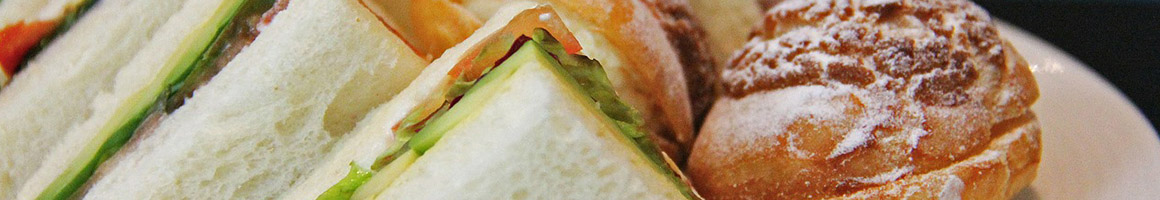 Eating Sandwich at Tjs Submarines restaurant in Artesia, CA.